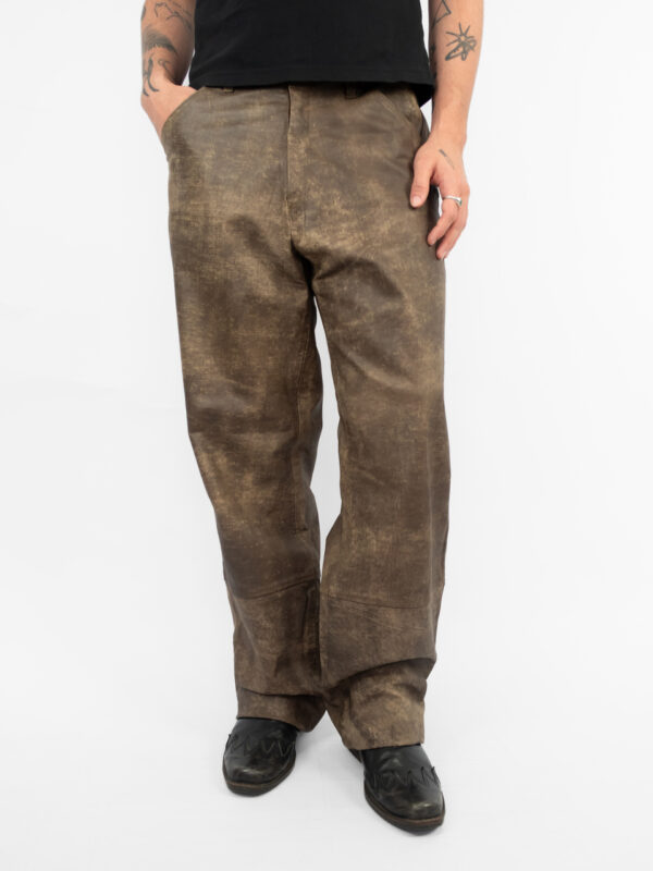 calça couro estonada